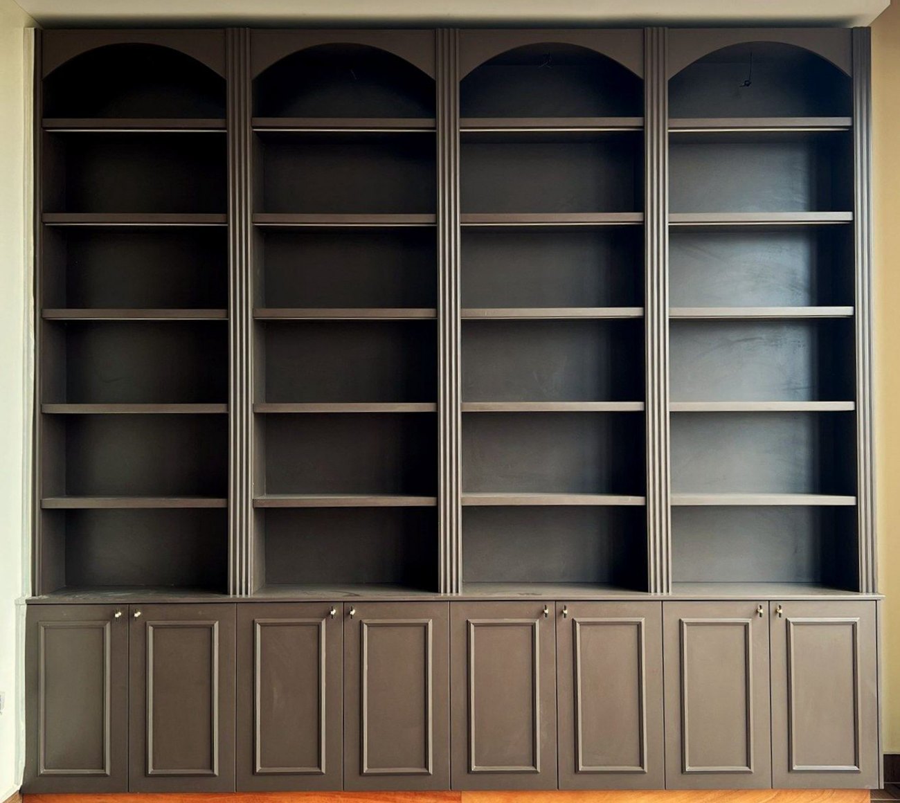 As delivered: the same arched shelving unit built by VIRA