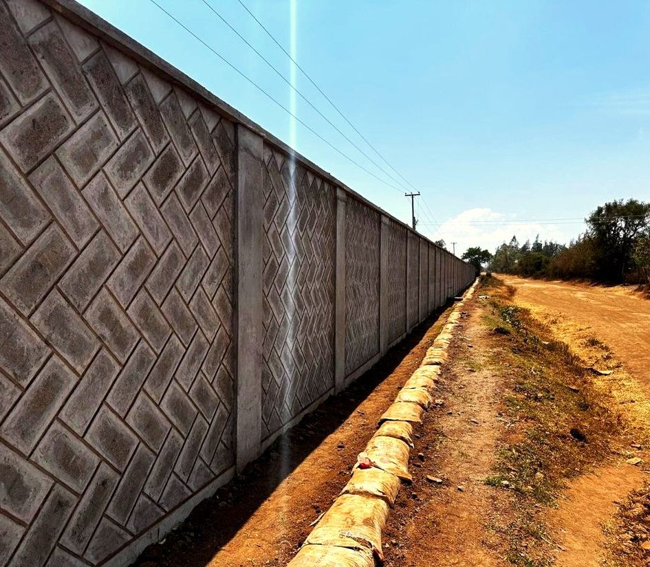 One-kilometre patterned perimeter wall at a factory in Obambo, Kisumu