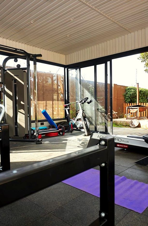 Outdoor gym fit-out with timber slat walls