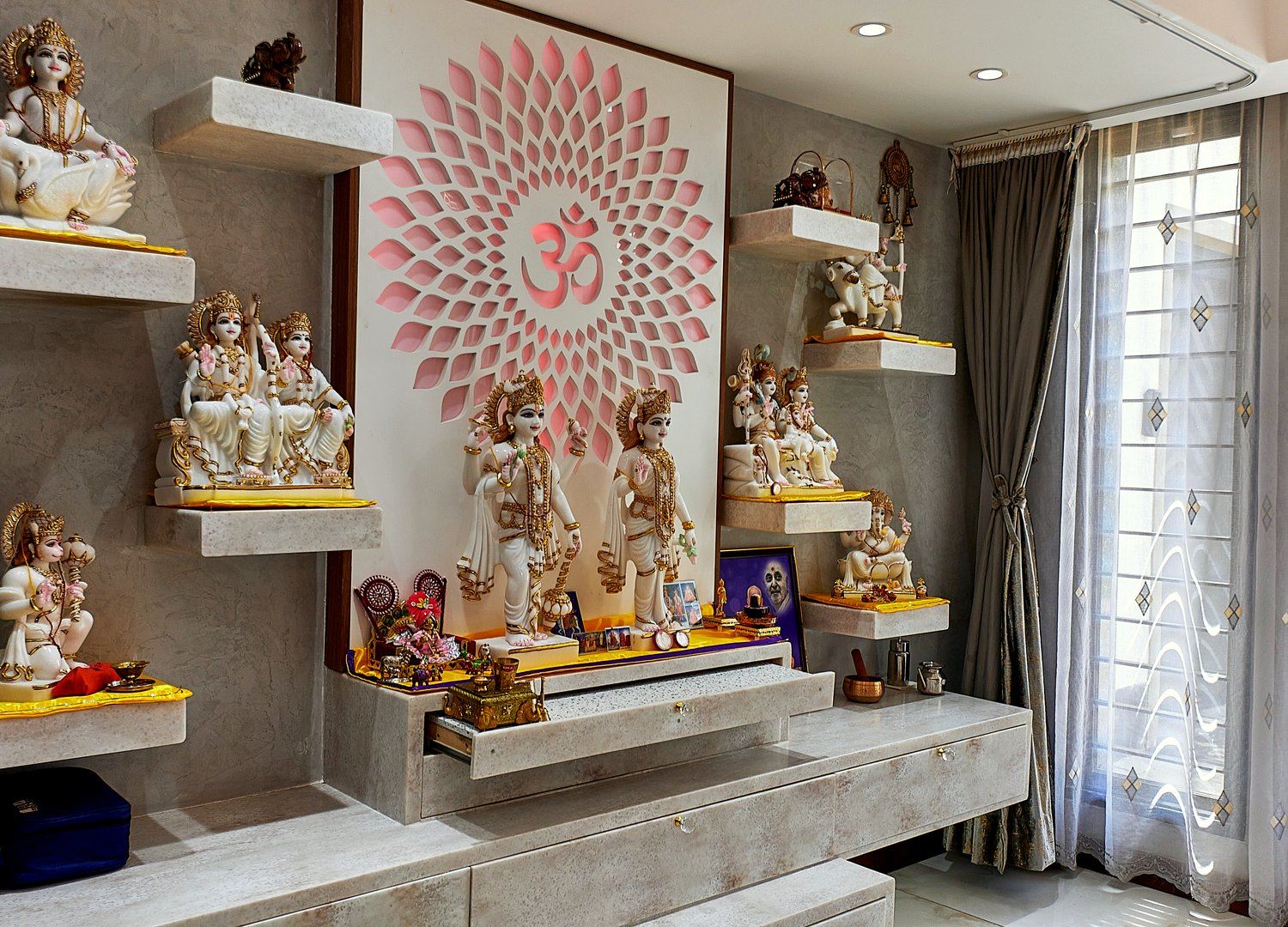 Custom pooja room with bespoke joinery and stone